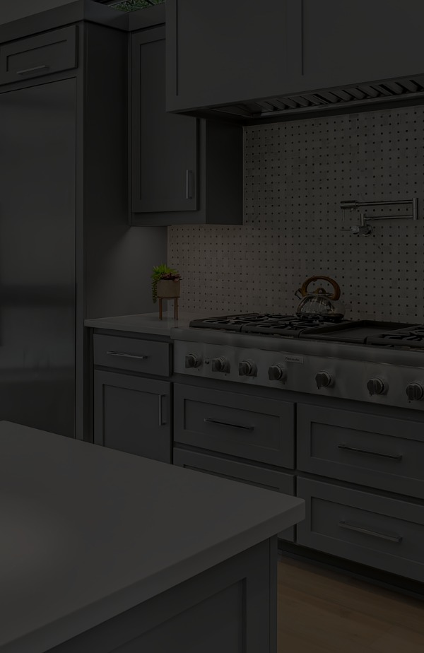 A dark shaker kitchen with a professional gas cooktop, made by Accent Kitchens